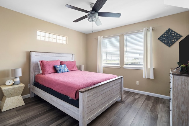 23401 Termini San Luis Pass Rd, Galveston, TX 77554 - bedroom with wood finished floors, baseboards, and a ceiling fan