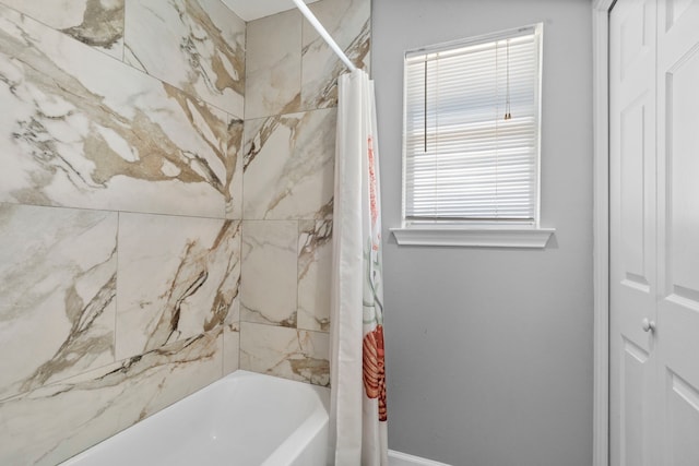 23401 Termini San Luis Pass Rd, Galveston, TX 77554 - bathroom with shower / tub combo with curtain and baseboards