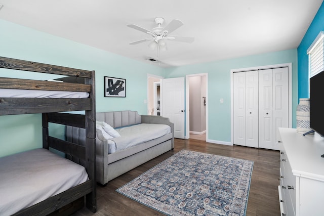 23401 Termini San Luis Pass Rd, Galveston, TX 77554 - bedroom featuring wood finished floors, a closet, a ceiling fan, and baseboards