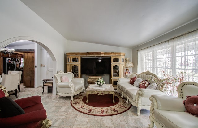 12313 Kayla Ln, Houston, TX 77015 - living room with lofted ceiling and arched walkways