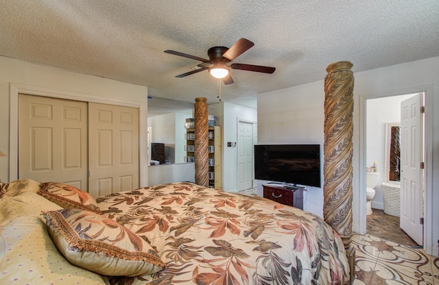 12313 Kayla Ln, Houston, TX 77015 - bedroom featuring a textured ceiling, ceiling fan, and ensuite bath