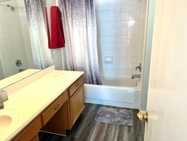 4938 Winding View Ln, Humble, TX 77346 - bathroom featuring wood finished floors, vanity, and shower / bath combination with curtain