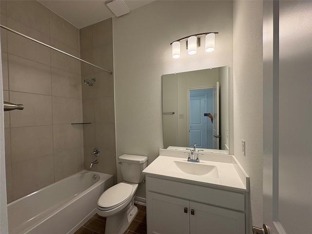208 Cider Gum Pl, Montgomery, TX 77316 - bathroom with toilet, a textured wall, vanity, and shower / tub combination