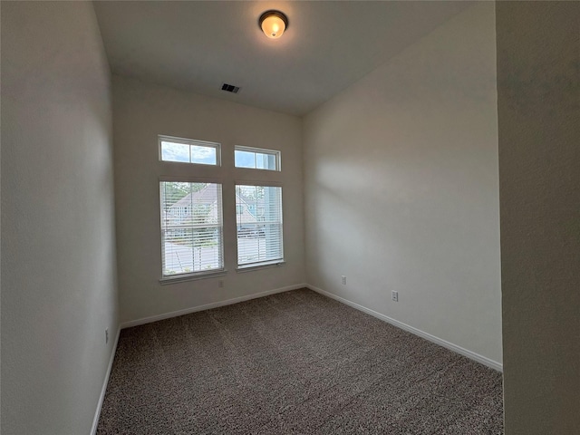 208 Cider Gum Pl, Montgomery, TX 77316 - empty room with dark carpet and baseboards