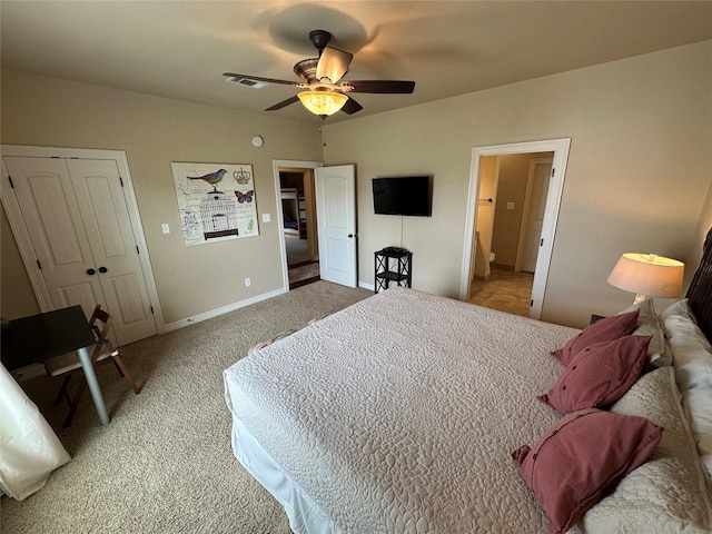 2029 Idyle Vw, Crystal Beach, TX 77650 - bedroom with light carpet, baseboards, ceiling fan, and a closet