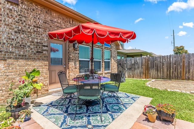 26511 Green Heron, Katy, TX 77494 - view of patio featuring fence and outdoor dining space
