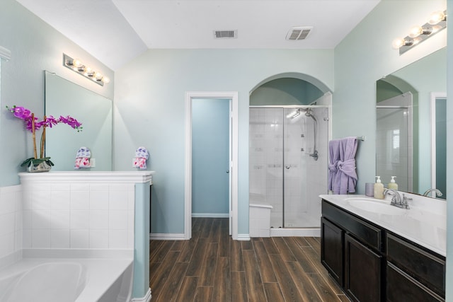 26511 Green Heron, Katy, TX 77494 - full bathroom featuring wood finished floors, a stall shower, a bath, vanity, and baseboards