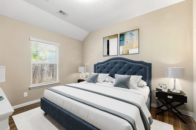 26511 Green Heron, Katy, TX 77494 - bedroom with dark wood finished floors, lofted ceiling, and baseboards