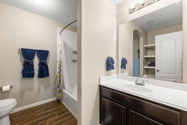 26511 Green Heron, Katy, TX 77494 - full bath featuring wood finished floors, toilet, baseboards, shower / bath combo with shower curtain, and vanity