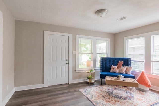 109 Porter St, La Marque, TX 77568 - sitting room featuring baseboards and wood finished floors