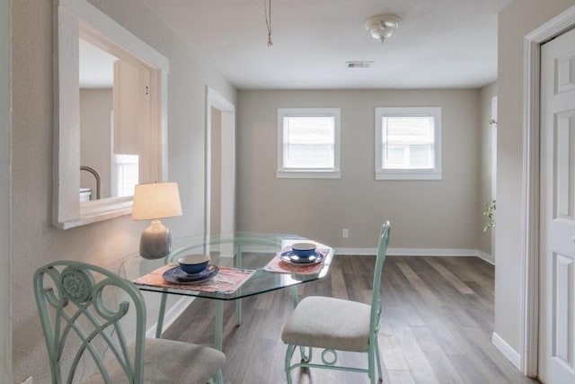 109 Porter St, La Marque, TX 77568 - dining area featuring wood finished floors and baseboards