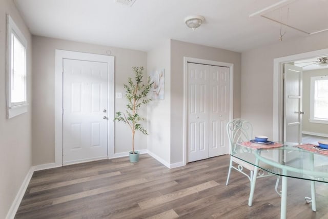 109 Porter St, La Marque, TX 77568 - foyer entrance featuring wood finished floors and baseboards