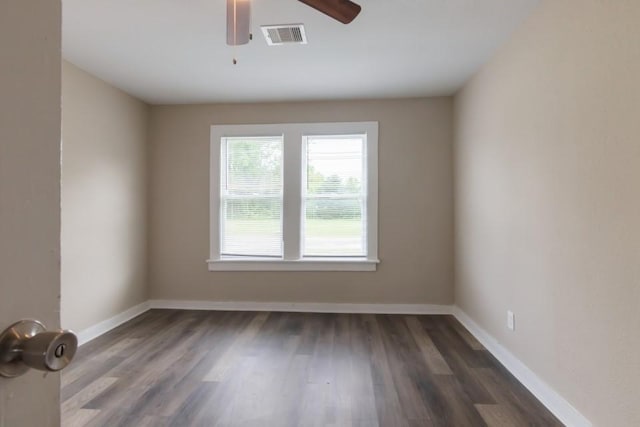 109 Porter St, La Marque, TX 77568 - spare room with ceiling fan, wood finished floors, and baseboards