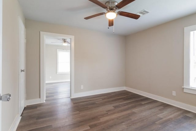 109 Porter St, La Marque, TX 77568 - empty room featuring dark wood-style floors and ceiling fan