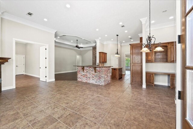 3490 Prescott Dr, Beaumont, TX 77706 - kitchen with a ceiling fan, ornamental molding, brown cabinetry, recessed lighting, and tile patterned flooring