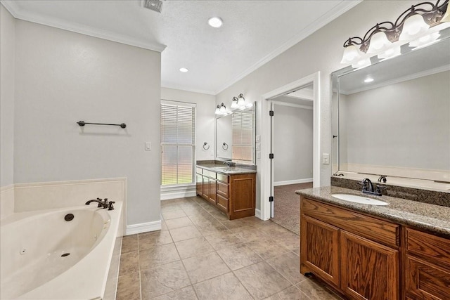 3490 Prescott Dr, Beaumont, TX 77706 - bathroom featuring two vanities, baseboards, ornamental molding, a whirlpool tub, and recessed lighting