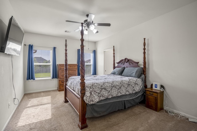 18724 Carrizo Trl, Magnolia, TX 77355 - bedroom with light colored carpet, baseboards, and a ceiling fan
