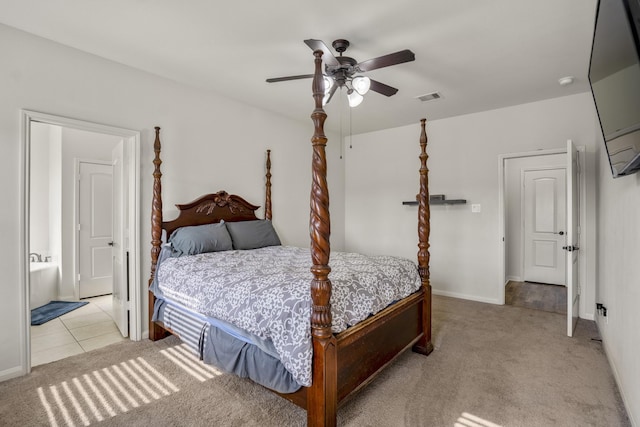 18724 Carrizo Trl, Magnolia, TX 77355 - bedroom featuring light colored carpet, ceiling fan, and baseboards