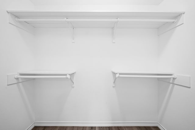 3009 Fm 50, Brenham, TX 77833 - walk in closet featuring dark wood-style floors