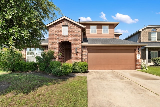 2910 High Garden Ln, Fresno, TX 77545 - traditional home with brick siding, concrete driveway, and a shingled roof