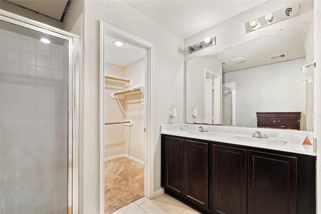 2910 High Garden Ln, Fresno, TX 77545 - full bath with a shower stall, tile patterned floors, a spacious closet, and double vanity