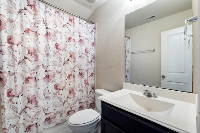 2910 High Garden Ln, Fresno, TX 77545 - bathroom featuring toilet, vanity, and a textured wall