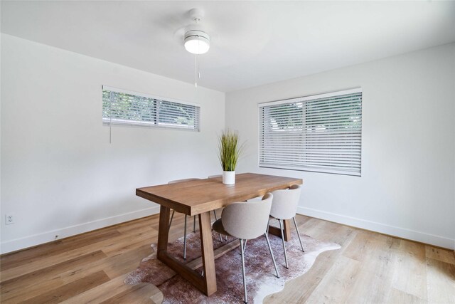 6019 Westover St, Houston, TX 77033 - dining area with plenty of natural light, baseboards, and light wood-style flooring