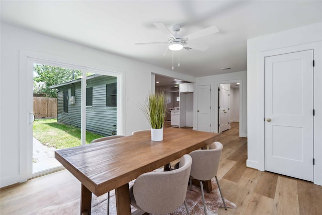6019 Westover St, Houston, TX 77033 - dining area featuring light wood-type flooring and a ceiling fan