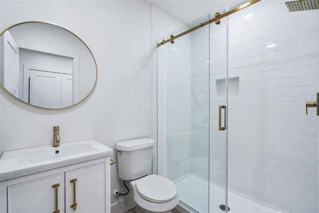 6019 Westover St, Houston, TX 77033 - bathroom featuring a stall shower, toilet, and vanity