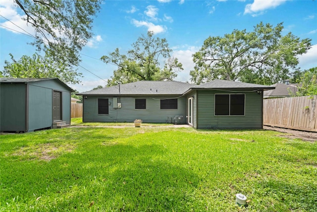 6019 Westover St, Houston, TX 77033 - rear view of property featuring an outdoor structure and a storage unit