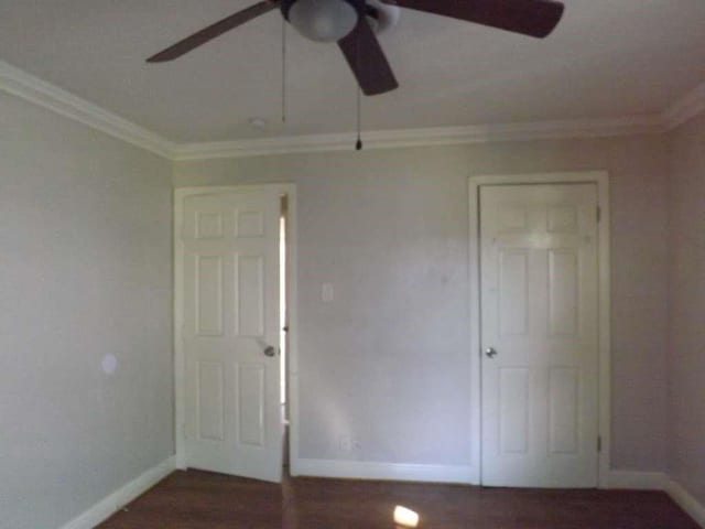 822 Harvard St, Deer Park, TX 77536 - spare room with ceiling fan, baseboards, crown molding, and wood finished floors