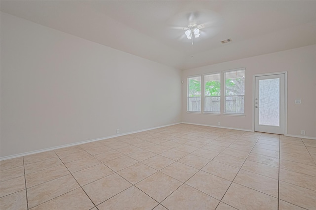 24511 Carlton Springs Ln, Katy, TX 77494 - unfurnished room featuring light tile patterned floors, baseboards, and a ceiling fan