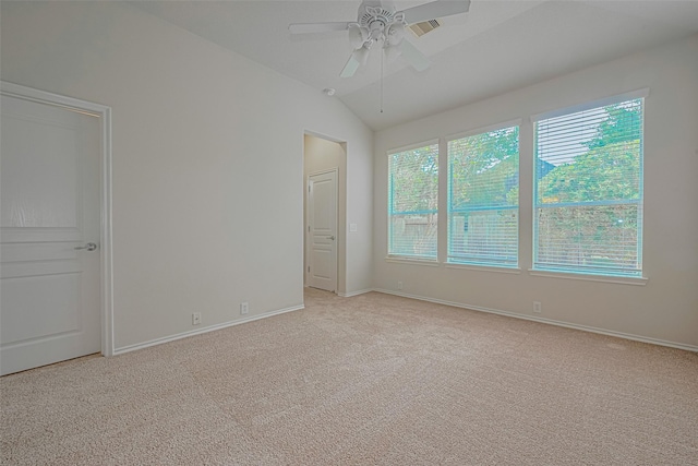 24511 Carlton Springs Ln, Katy, TX 77494 - unfurnished room featuring light carpet, a ceiling fan, baseboards, and lofted ceiling