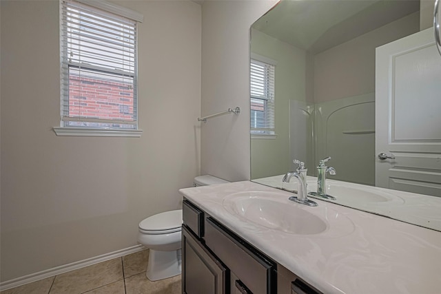 24511 Carlton Springs Ln, Katy, TX 77494 - bathroom featuring toilet, baseboards, vanity, and tile patterned floors