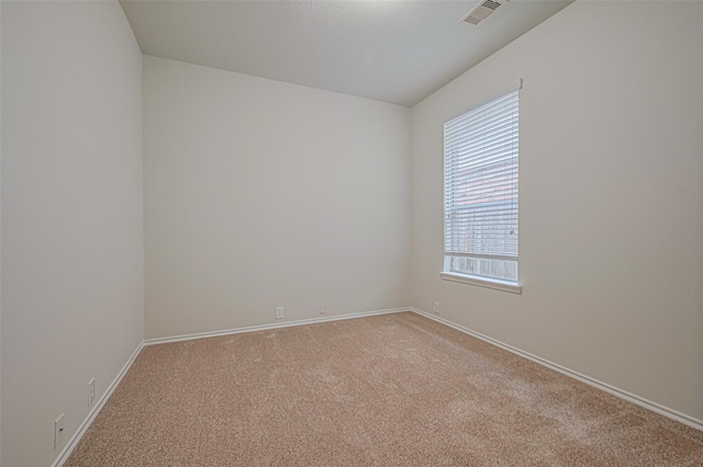 24511 Carlton Springs Ln, Katy, TX 77494 - carpeted empty room with healthy amount of natural light and baseboards