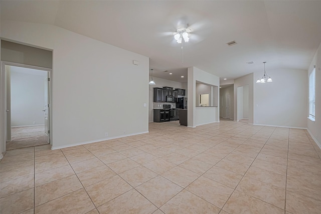 24511 Carlton Springs Ln, Katy, TX 77494 - unfurnished living room featuring lofted ceiling, a chandelier, light tile patterned floors, baseboards, and a ceiling fan