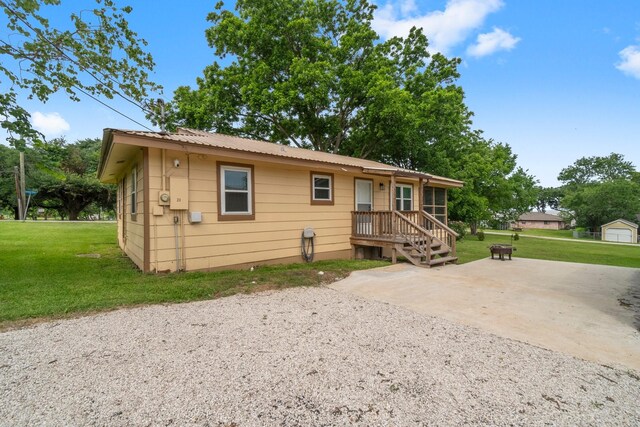 21 Clearview St, Point Blank, TX 77364 - view of front of property with a front yard