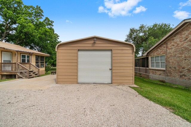 21 Clearview St, Point Blank, TX 77364 - detached garage with driveway