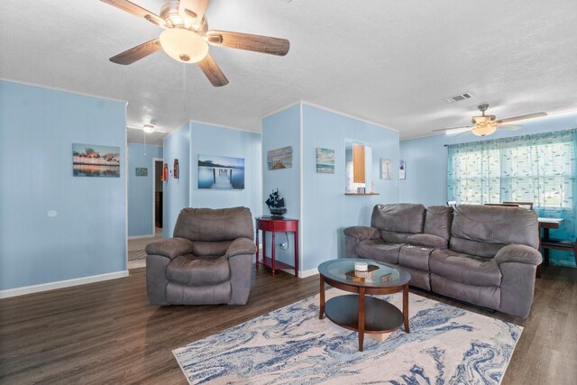 21 Clearview St, Point Blank, TX 77364 - living room featuring a ceiling fan, wood finished floors, a textured ceiling, and baseboards