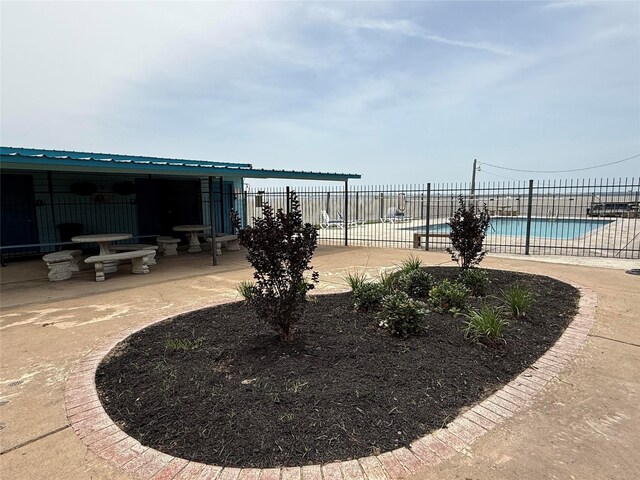 21 Clearview St, Point Blank, TX 77364 - view of yard featuring a community pool and a patio area
