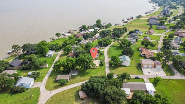 21 Clearview St, Point Blank, TX 77364 - aerial view of property and surrounding area featuring nearby suburban area and a large body of water