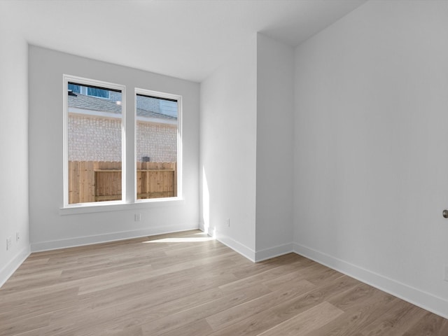 14674 Hereford Grove Ln, Montgomery, TX 77316 - spare room with light wood-style flooring and baseboards