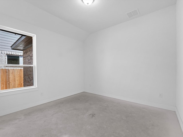 14674 Hereford Grove Ln, Montgomery, TX 77316 - unfurnished room with concrete flooring, vaulted ceiling, and baseboards