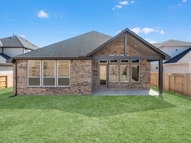 14674 Hereford Grove Ln, Montgomery, TX 77316 - rear view of property featuring brick siding, a patio, and roof with shingles
