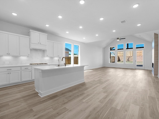 14674 Hereford Grove Ln, Montgomery, TX 77316 - kitchen featuring a sink, plenty of natural light, a ceiling fan, white cabinetry, and recessed lighting