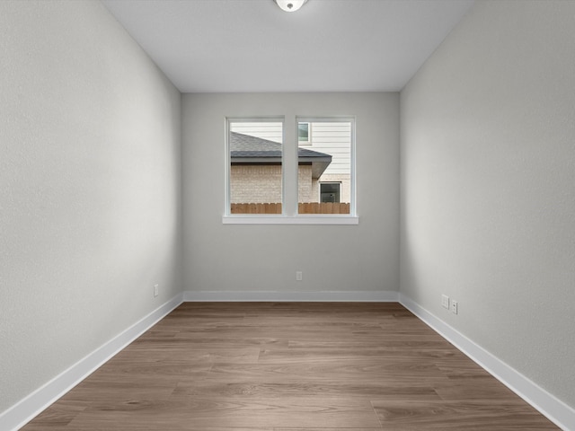 14690 Hereford Grove Ln, Montgomery, TX 77316 - unfurnished room featuring wood finished floors and baseboards