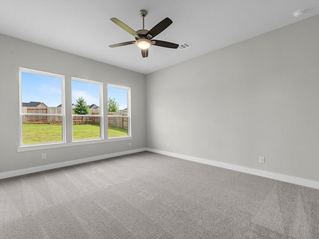 14690 Hereford Grove Ln, Montgomery, TX 77316 - carpeted empty room featuring baseboards, ceiling fan, and a smoke detector