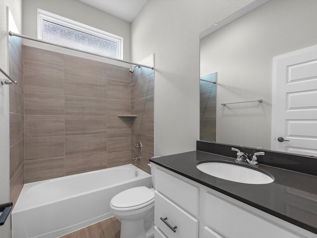 14690 Hereford Grove Ln, Montgomery, TX 77316 - bathroom featuring vanity, toilet, bathtub / shower combination, and wood finished floors