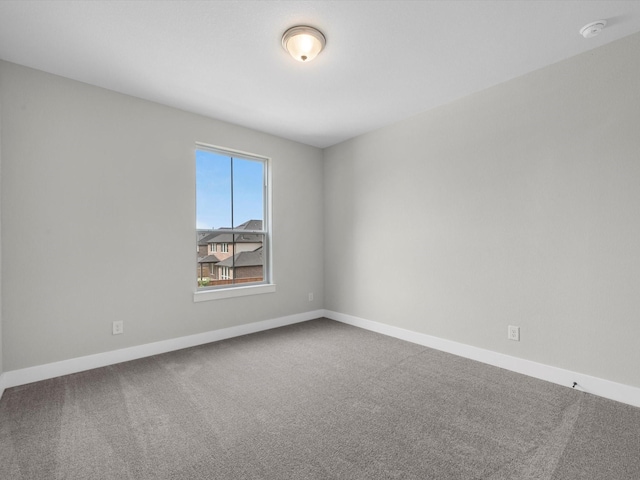 14690 Hereford Grove Ln, Montgomery, TX 77316 - carpeted empty room featuring a smoke detector and baseboards