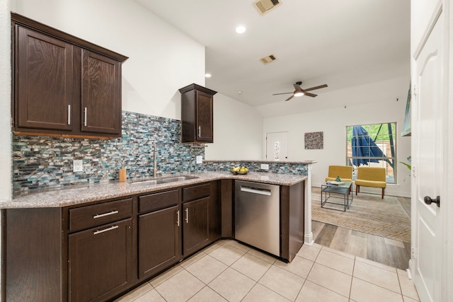 5106 Hardy St, Houston, TX 77009 - kitchen featuring stainless steel dishwasher, a sink, a peninsula, dark brown cabinetry, and ceiling fan
